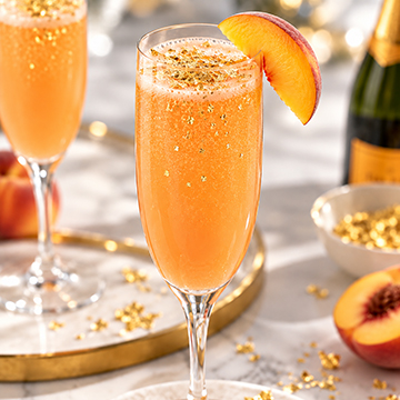 Bellini cocktails dusted with gold flake